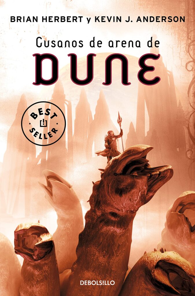 Portada de Gusanos de arena de Dune, octava novela de la saga. Muestra varios gusanos alzando la cabeza hacia el cielo y un hombre con una lanza sobre uno de ellos.